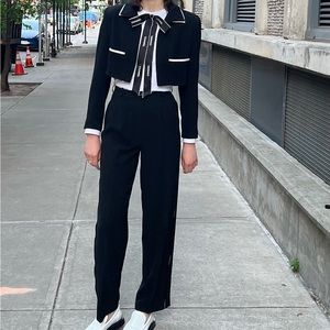 Iconic 90s trousers with Chanel logo ribbon trim